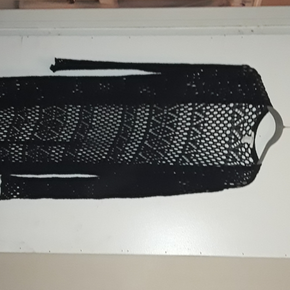 Women's full length knit overcoat.